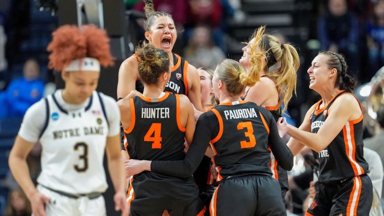 Oregon State players celebrate after defeating Notre Dame in a Sweet Sixteen round college basketball game during the NCAA Tournament, Friday, March 29, 2024, in Albany, N.Y. (Mary Altaffer/AP Photo)