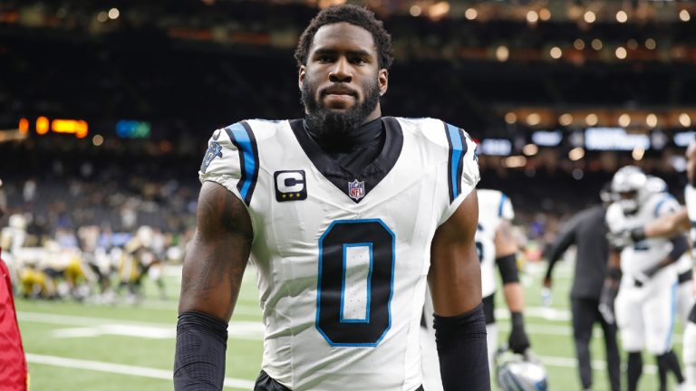 Brian Burns (0) warms up before an NFL football game against the New Orleans Saints, Sunday, Dec. 10, 2023, in New Orleans. (Tyler Kaufman/AP)