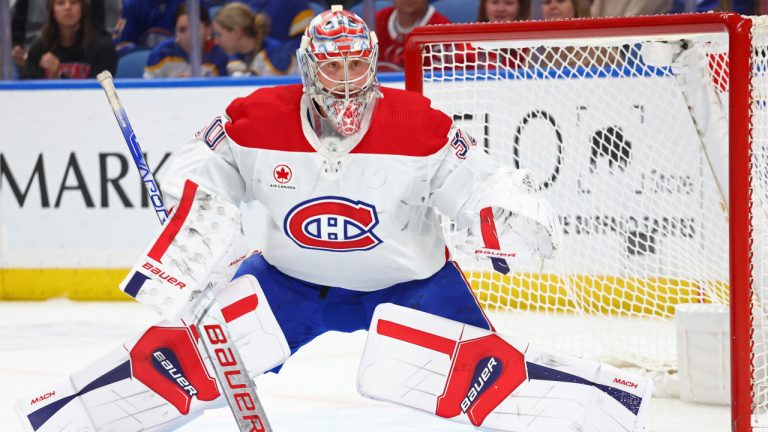 Montreal Canadiens goaltender Cayden Primeau (30) watches the puck during the first period of an NHL hockey game against the Buffalo Sabres Saturday, Dec. 9, 2023, in Buffalo, N.Y. (Jeffrey T. Barnes/AP) 