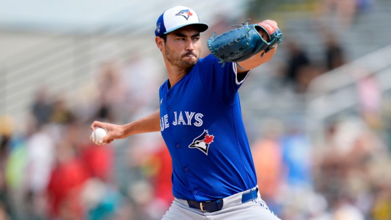 Toronto Blue Jays relief pitcher Mitch White (45) throws in the fourth inning of a spring training baseball game against the Pittsburgh Pirates Tuesday, March 5, 2024, in Bradenton, Fla. (AP Photo/Charlie Neibergall) 