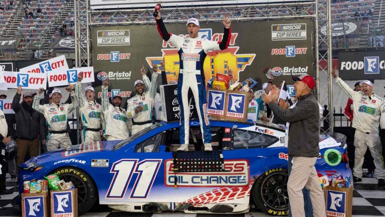 Denny Hamlin, center, celebrates after winning a NASCAR Cup Series auto race, Sunday, March 17, 2024, in Bristol, Tenn. (Wade Payne/AP)