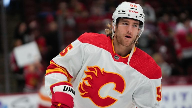 Calgary Flames defenceman Noah Hanifin warms up before an NHL hockey game against the Chicago Blackhawks, Sunday, Jan. 7, 2024, in Chicago. (AP)