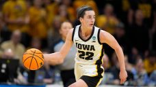 Clark scores 32, top seed Iowa survives to beat West Virginia