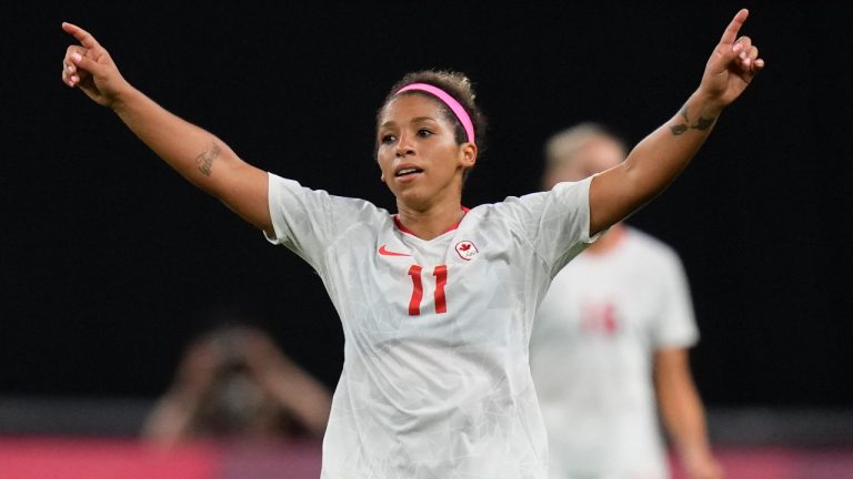 Canada's Desiree Scott celebrates at the end of a soccer match. (Silvia Izquierdo/AP)