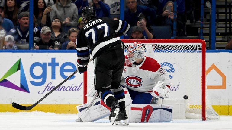 Tampa Bay Lightning defenceman Victor Hedman (77) scores on Montreal Canadiens goaltender Cayden Primeau (30) during the shootout of an NHL hockey game Saturday, March 2, 2024, in Tampa, Fla. (Jason Behnken/AP)