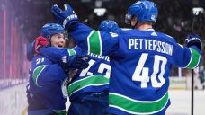 Hoglander scores twice as Canucks double up Flames 