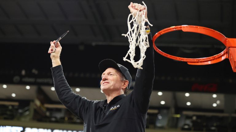 Long Beach State head coach Dan Monson participates in a net cutting ceremony after his team played an NCAA college basketball game against UC Davis in the championship of the Big West Conference men's tournament Saturday, March 16, 2024, in Henderson, Nev. Long Beach State won 74-70. (Ronda Churchill/AP)