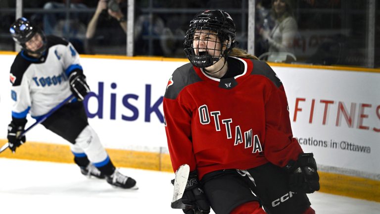 Ottawa's Daryl Watts (9) celebrates a goal as Toronto's Blayre Turnbull (40) skates away, during second period PWHL hockey action in Ottawa, on Saturday, March 23, 2024. THE CANADIAN PRESS/Justin Tang