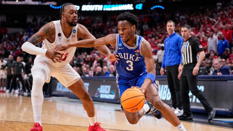 Duke's Jeremy Roach (3) drives against Houston's J'Wan Roberts during the second half of a Sweet 16 college basketball game in the NCAA Tournament in Dallas, Friday, March 29, 2024. (Tony Gutierrez/AP)