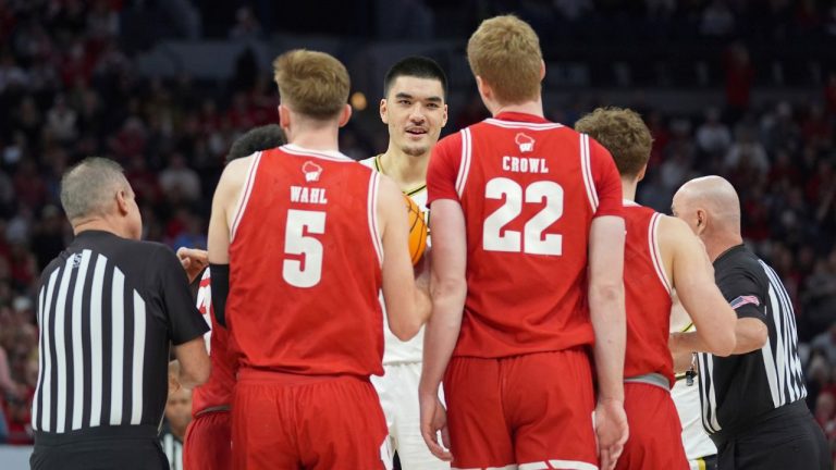 Purdue centre Zach Edey gets into an altercation with Wisconsin players during the first half of an NCAA college basketball game in the semifinal round of the Big Ten Conference tournament, Saturday, March 16, 2024, in Minneapolis. (Abbie Parr/AP Photo)