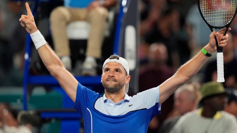 Grigor Dimitrov of Bulgaria celebrates after defeating Carlos Alcaraz of Spain during the Miami Open tennis tournament, Thursday, March 28, 2024, in Miami Gardens, Fla. (AP Photo/Marta Lavandier)