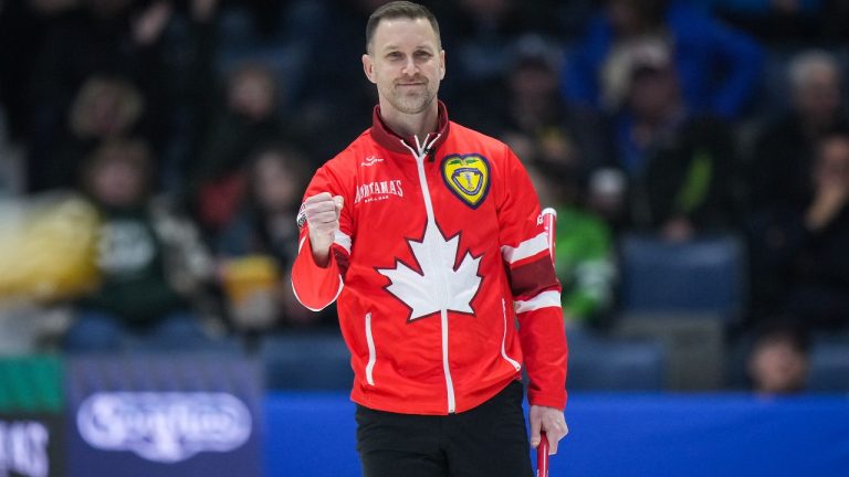 Canada skip Brad Gushue celebrates after scoring three against Saskatchewan with his final rock in the fourth end during the final at the Brier, in Regina, Sunday, March 10, 2024. (Darryl Dyck/CP)