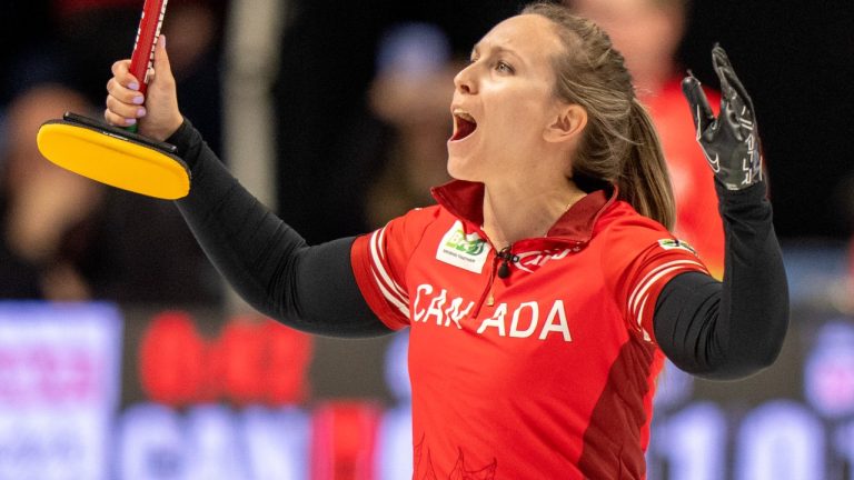 Canada skip Rachel Homan celebrates after defeating Korea to advance to the gold medal game at the World Women's Curling Championship in Sydney, N.S. on Saturday, March 23, 2024. (Frank Gunn/CP)