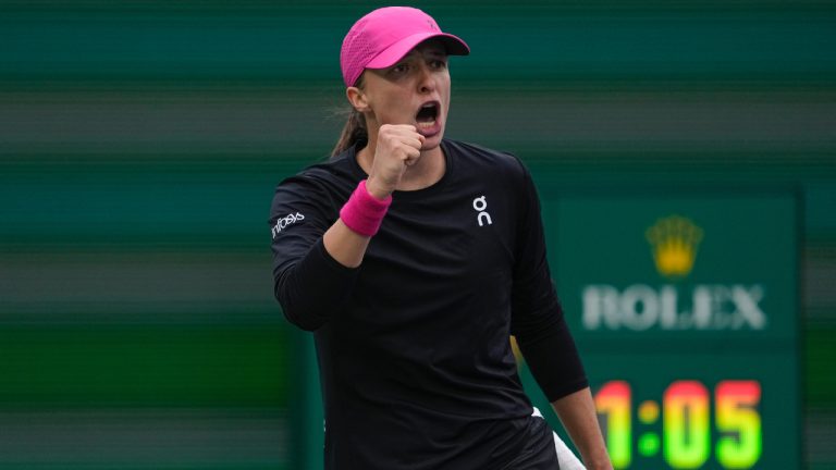 Iga Swiatek, of Poland, celebrates winning a point against Marta Kostyuk, of Ukraine, during a semifinal match at the BNP Paribas Open tennis tournament, Friday, March 15, 2024, in Indian Wells, Calif. (Mark J. Terrill/AP)