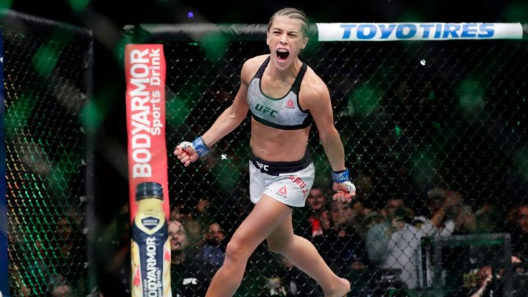 Poland's Joanna Jedrzejczyk runs around the octagon before a women's strawweight title bout against Rose Namajunas at UFC 223 Saturday, April 7, 2018, in New York. Namajunas won the fight. (Frank Franklin II/AP Photo)