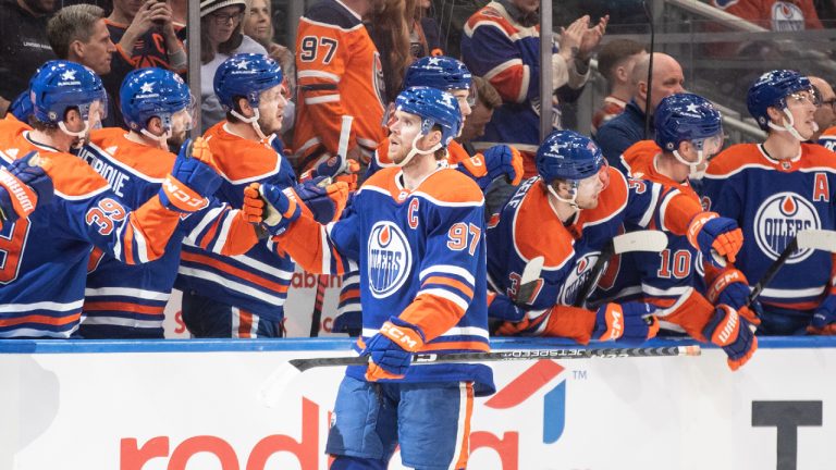 Edmonton Oilers' Connor McDavid (97) celebrates a goal against the Anaheim Ducks during first period NHL action in Edmonton on Saturday March 30, 2024. (Jason Franson/CP)