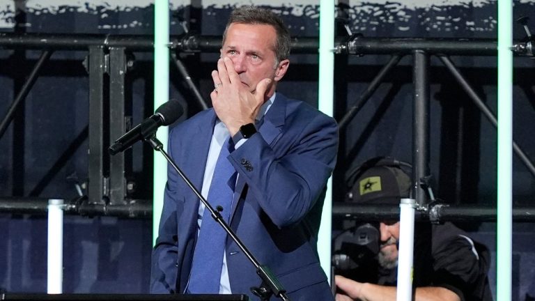 Former Dallas Stars player Mike Modano reacts as he speaks before the unveiling of his statue after the first period an NHL hockey game between the Los Angeles Kings and the Stars in Dallas, Saturday, March 16, 2024. (LM Otero/AP Photo)