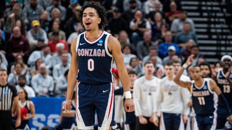 Gonzaga guard Ryan Nembhard celebrates a teammate's basket against Kansas during the second half of a second-round college basketball game in the NCAA Tournament in Salt Lake City, Saturday, March 23, 2024. (Isaac Hale/AP Photo)