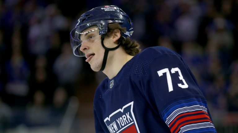 New York Rangers centre Matt Rempe takes a break during the first period of an NHL hockey game against the St. Louis Blues, Saturday, March 9, 2024, in New York. (John Munson/AP)