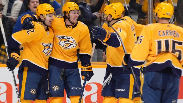 Nashville Predators centre Cody Glass, second from left, celebrates his goal with teammates during the second period of an NHL hockey game against the Colorado Avalanche, Saturday, March 2, 2024, in Nashville, Tenn. (George Walker IV/AP)