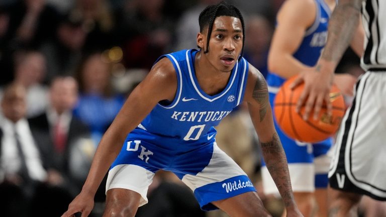 Kentucky guard Rob Dillingham (0) plays during the second half of an NCAA college basketball game against Vanderbilt, Tuesday, Feb. 6, 2024, in Nashville, Tenn. (AP Photo/George Walker IV)