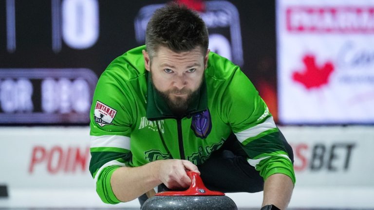 Saskatchewan skip Mike McEwen delivers a rock while playing Northwest Territories during the Brier, in Regina, on Wednesday, March 6, 2024. (Darryl Dyck/CP)