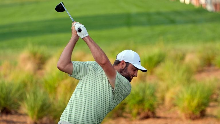 Scottie Scheffler tees off on the 18th hole during the third round of the Arnold Palmer Invitational golf tournament Saturday, March 9, 2024, in Orlando, Fla. (John Raoux/AP Photo)