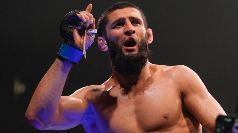 Khamzat Chimaev celebrates after he beats Kamaru Usman in a middleweight fight at UFC 294. (Kamran Jebreili/AP)