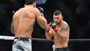 Former UFC middleweight champion Chris Weidman in a mixed martial arts bout. (Gregory Payan/AP)