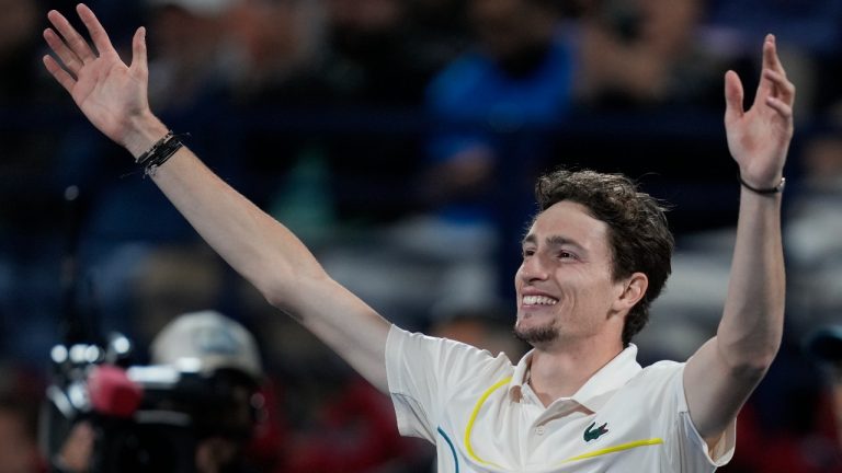 Ugo Humbert of France celebrates after beating Alexander Bublik of Kazakhstan during the final match of the Dubai Duty Free Tennis Championships in Dubai, United Arab Emirates, Saturday, March 2, 2024. (AP Photo/Kamran Jebreili)