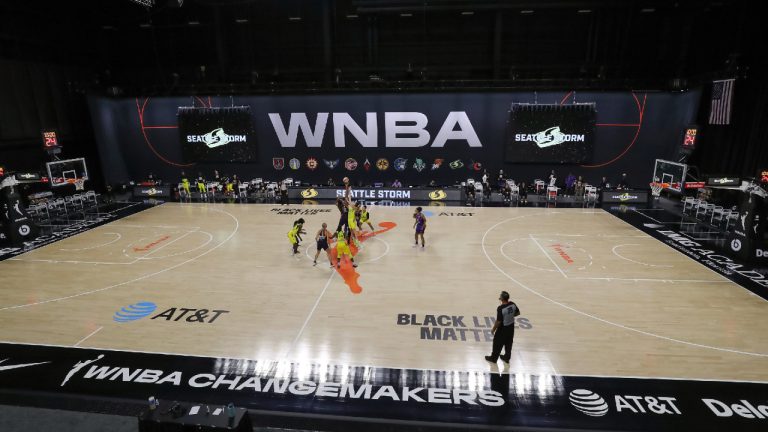 A general view of tipoff between Phoenix Mercury and Seattle Storm during the first half of a WNBA basketball game Saturday, Aug. 8, 2020, in Bradenton, Fla. (Mike Carlson/AP)