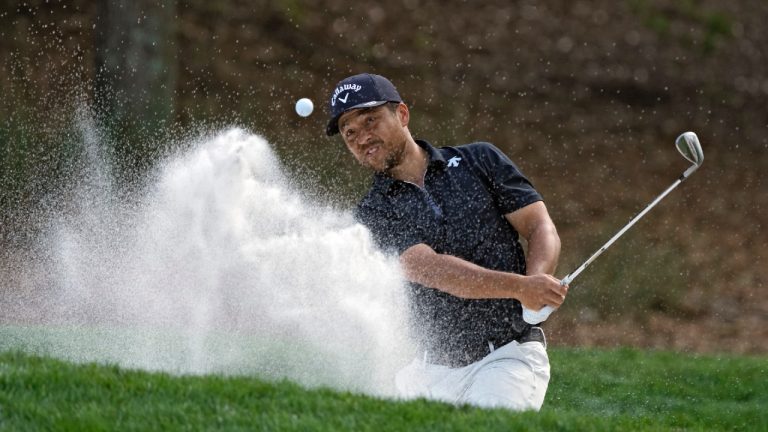 Xander Schauffele blasts from the sand on the eighth hole during the third round of The Players Championship golf tournament Saturday, March 16, 2024, in Ponte Vedra Beach, Fla. (Lynne Sladky/AP)