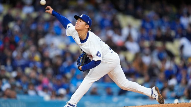 Los Angeles Dodgers starting pitcher Yoshinobu Yamamoto throws against the St. Louis Cardinals during the second inning of a baseball game Saturday, March 30, 2024, in Los Angeles. (AP Photo/Jae C. Hong)