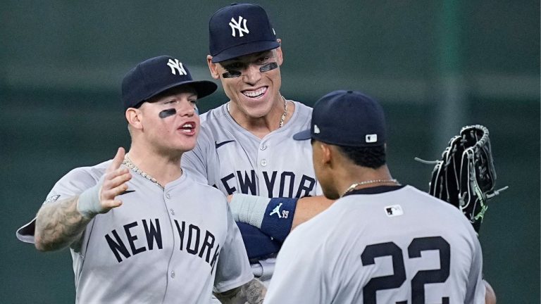 New York Yankees left fielder Alex Verdugo, centre fielder Aaron Judge and right fielder Juan Soto celebrate after an opening-day baseball game against the Houston Astros, Thursday, March 28, 2024, in Houston. (Kevin M. Cox/AP Photo)