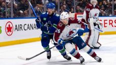 Canucks blow three-goal lead, fall to Avalanche in OT