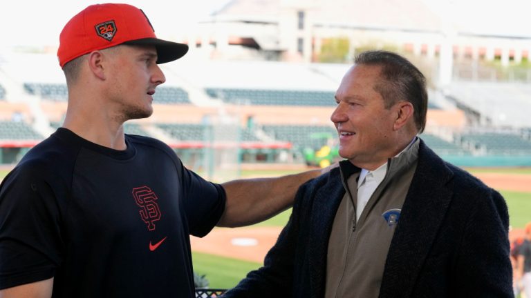 New San Francisco Giants infielder Matt Chapman, left, talks with his agent Scott Boras after Chapman's baseball press conference announcing his signing Monday, March 4, 2024, in Scottsdale, Ariz. (Ross D. Franklin/AP)