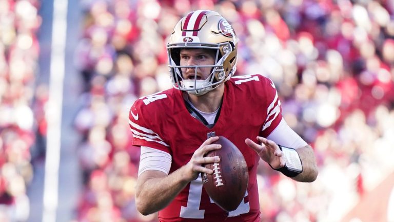 San Francisco 49ers quarterback Sam Darnold (14) looks to pass during an NFL football game against the Los Angeles Rams in Santa Clara, Calif., Sunday, Jan. 7, 2024. (Loren Elliott/AP)