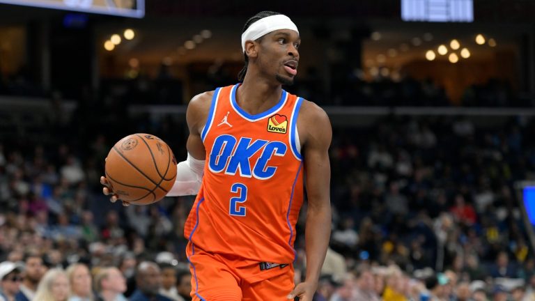 Oklahoma City Thunder guard Shai Gilgeous-Alexander (2) handles the ball in the second half of an NBA basketball game against the Memphis Grizzlies Saturday, March 16, 2024, in Memphis, Tenn. (Brandon Dill/AP)