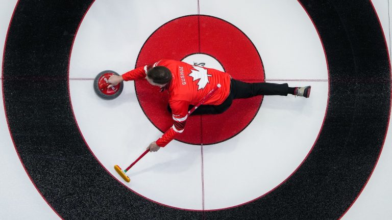 Canada skip Brad Gushue delivers a rock while playing Northwest Territories during the Brier, in Regina, on Monday, March 4, 2024. (Darryl Dyck/CP)