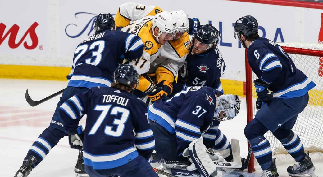 Jets lose to red-hot Predators without Scheifele