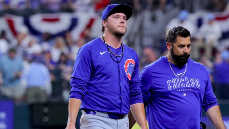 Chicago Cubs starting pitcher Justin Steele, left, leaves the game after injuring his left leg during the fifth inning of a baseball game against the Texas Rangers, Thursday, March 28, 2024 in Arlington, Texas. (Gareth Patterson/AP)