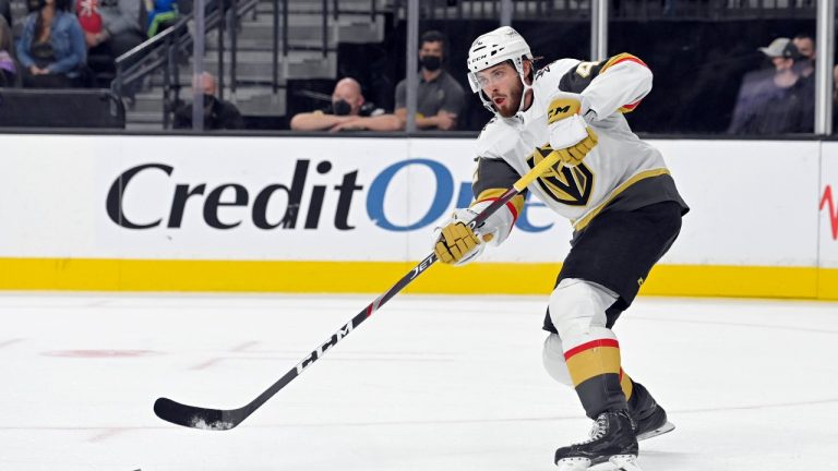 Vegas Golden Knights right wing Daniil Miromanov hits the puck against the Los Angeles Kings during the third period of an NHL preseason hockey game Friday, Oct. 1, 2021, in Las Vegas. (David Becker/AP Photo)