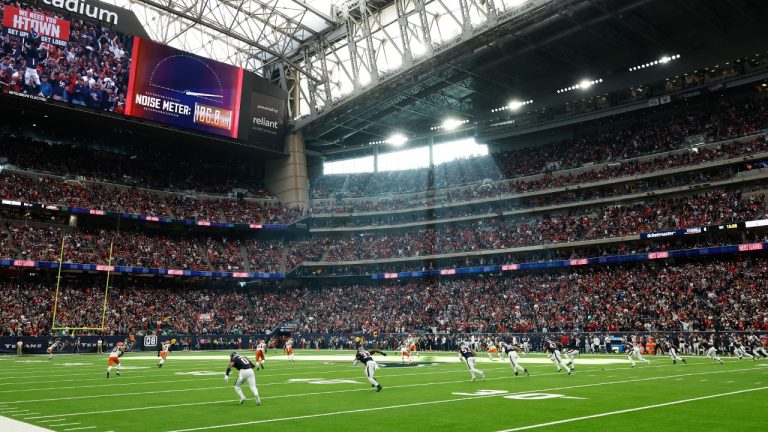 FILE - The opening kickoff in a general stadium view during an NFL wild-card playoff football game, Jan. 13, 2024, in Houston. The NFL competition committee is proposing a rule to penalize so-called “hip-drop” tackles and a radical change to kickoffs to add more returns without compromising safety. (Matt Patterson/AP)