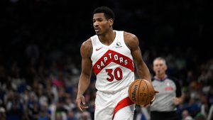 Toronto Raptors guard Ochai Agbaji (30) brings the ball up the court during the second half of an NBA basketball game against the Orlando Magic, Sunday, March 17, 2024, in Orlando, Fla. (Phelan M. Ebenhack/AP)