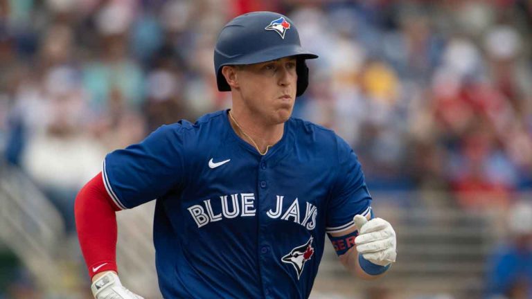 Toronto Blue Jays catcher Brian Serven runs out a ground ball during spring training action against the Boston Red Sox. (Mark Taylor/THE CANADIAN PRESS)