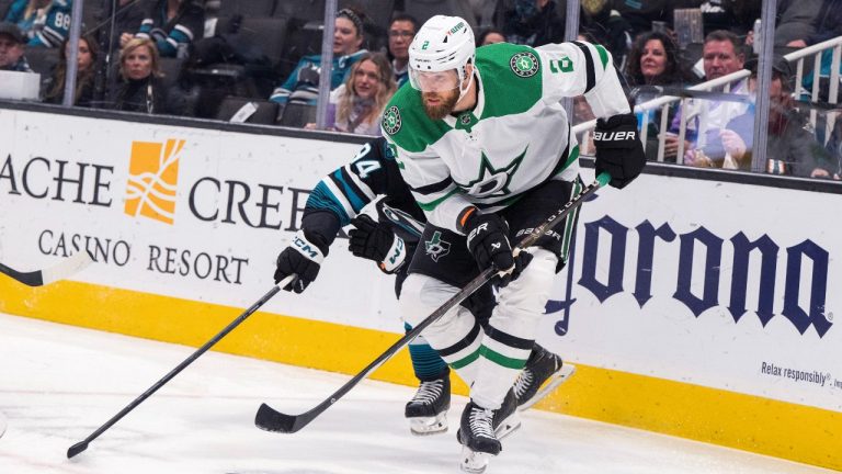 Former Dallas Stars defenseman Jani Hakanpaa (2) vies for the puck against San Jose Sharks defenseman Jan Rutta (84) during the first period of an NHL hockey game Tuesday, March 5, 2024, in San Jose, Calif. (Nic Coury/AP Photo)