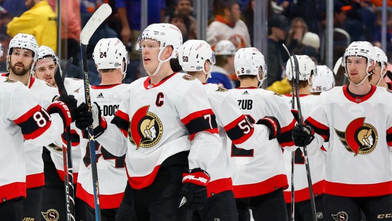 Ottawa Senators left wing Brady Tkachuk (7) celebrates with teammates after defeating the New York Islanders 4-3 in overtime in an NHL hockey game, Saturday, March 16, 2024, in Elmont, N.Y. (Noah K. Murray/AP)