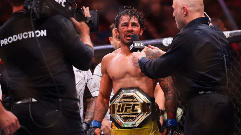 Alexandre Pantoja is interviewed after his win over Brandon Moreno during a flyweight mixed martial arts bout during UFC 290 in Las Vegas. (Wade Vandervort/Las Vegas Sun via AP)