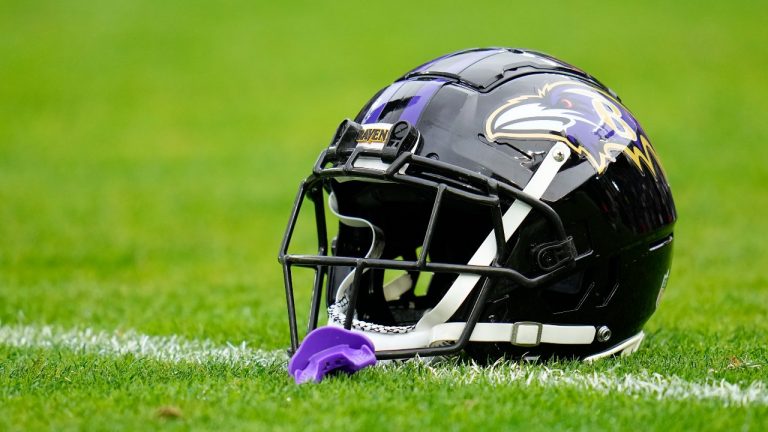 A Baltimore Ravens helmet is seen on the field prior to the AFC Championship NFL football game between the Baltimore Ravens and the Kansas City Chiefs, Sunday, Jan. 28, 2024, in Baltimore. The Chiefs won 17-10. (AP Photo/Julio Cortez)