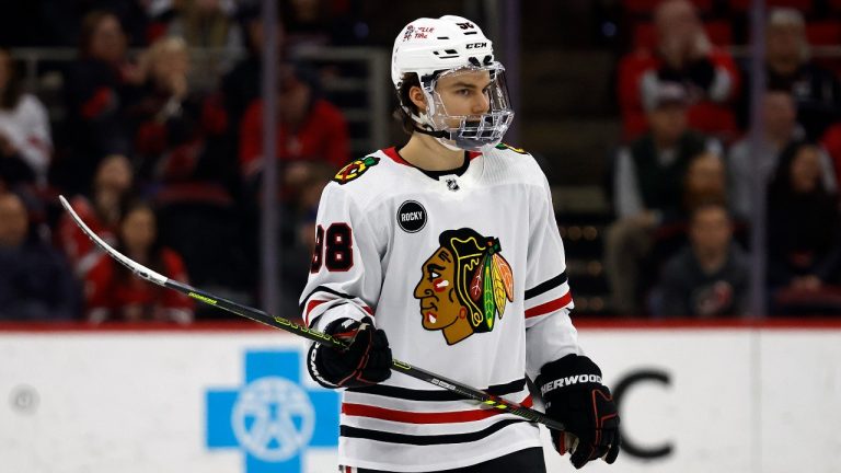 Chicago Blackhawks' Connor Bedard (98) watches the puck against the Carolina Hurricanes during the third period of an NHL hockey game in Raleigh, N.C., Monday, Feb. 19, 2024. (AP Photo/Karl B DeBlaker)